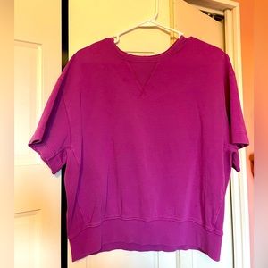 Bright pink/purple baggy workout crop top